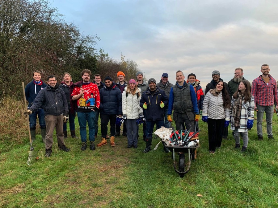 WEG volunteers with tools and wheelbarrow